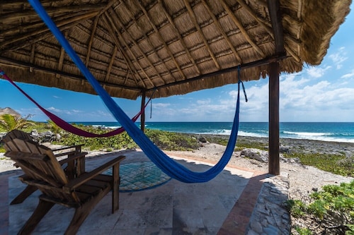 4 Bedroom oceanfront home centrally located in Akumal. Pool, AC, Wifi, Cook