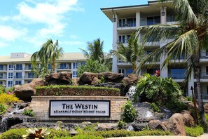Surrounded by lush tropical landscaping and a small waterfall, this resort offers ocean views from its modern balconies.