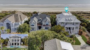 A large, multi-story house with a pool, surrounded by lush greenery and a beach view. - 31A Dune Lane - This DIRECT oceanfront home will take your breath away! (Hilton Head Island)