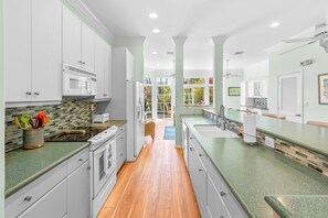 Fridge, microwave, oven, stovetop - Elegant home with with patio & community pool - walk to beaches & Duval Street (Key West)