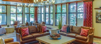 Ski-in/out studio condo with heated underground parking, hot tub & grill