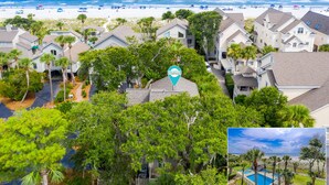 A residential area with houses, a beach, and a pool. - 106 Oceanwood Trace - 2nd Row Ocean View, Dog Friendly Beachside Oasis. (Hilton Head Island)