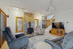 TV, fireplace, DVD player, foosball - Lakefront home with water access, views of the mountains, private deck & patio (Colchester)