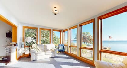Lakefront home with water access, views of the mountains, private deck & patio