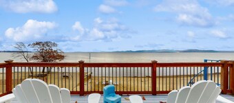 Lakefront home with water access, views of the mountains, private deck & patio