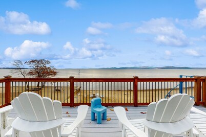 Lakefront home with water access, views of the mountains, private deck & patio