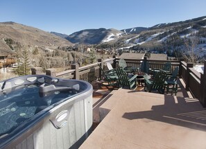 Relax on the balcony with a hot tub and take in the breathtaking mountain views from the comfort of Adirondack chairs.