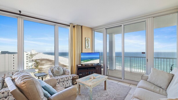 A spacious balcony with a view of the beach and ocean. - Island Tower 1001 by Liquid Life (Gulf Shores)