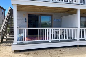 Outdoor dining - Cape Cod condo with covered deck & access to private beach (Provincetown)