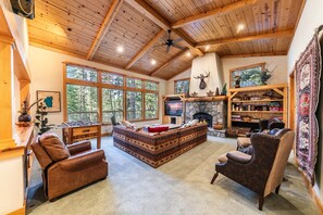 TV, fireplace, table football, books