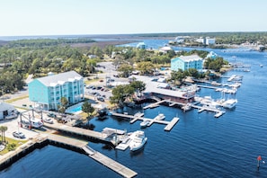 Overlooking the marina, this property offers stunning views of docked boats and surrounding structures.