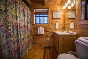 Combined shower/bathtub, hair dryer, towels, soap