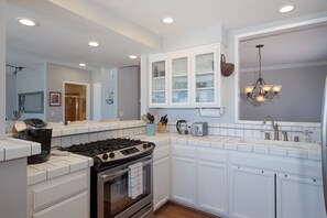 Fridge, microwave, dishwasher, coffee/tea maker