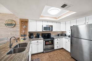 Fridge, microwave, dishwasher, coffee/tea maker