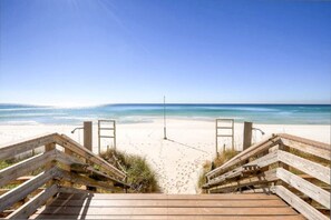 A wooden boardwalk leading to a sandy beach with a clear view of the ocean. - ✨Seascape 38A | 2BR Steps2Beach | Across from Heated Pool | Pet Friendly 🐾 (Miramar Beach)