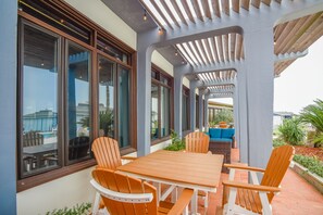 Outdoor dining - Newly Renovated Coastal Condo! Ocean Views! Community Game Room! (Port Aransas)