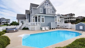 A two-story house with a swimming pool, a hot tub, and a covered deck area. - Doc's Landing: Private Pool, Hot Tub, Currituck Club (Corolla)