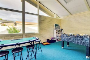 Game room - Dog-friendly waterfront home with pool, tennis courts, & large lawn (Orondo)
