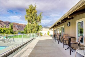 Outdoor dining - Dog-friendly waterfront home with pool, tennis courts, & large lawn (Orondo)