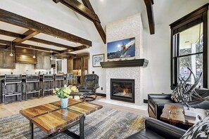 Flat-screen TV, fireplace, DVD player, stereo