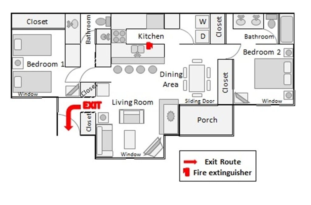 A floor plan of a hotel with two bedrooms, a kitchen, a dining area, a living room, a bathroom, and an exit route marked with a fire extinguisher.