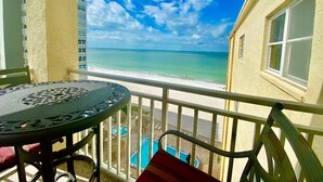 A balcony with a view of the beach and ocean. - Savor Gulf Views! 3/3 Heated Pool/Spa, Beachside - 603 (Redington Shores)