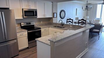 Coffee/tea maker, fridge, microwave, oven