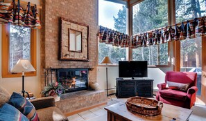 Flat-screen TV, fireplace