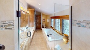 Combined shower/tub, jetted tub, hair dryer, towels