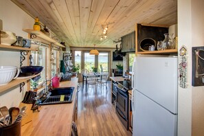 Fridge, microwave, oven, stovetop - Unique waterfront home with lake & ocean views plus private sauna (Lopez Island)