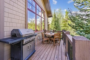 Enjoy al fresco dining on the deck with a barbecue grill and seating for four.