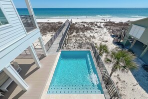 A heated pool - Morning Tide by GSVR | Beachfront Luxury w/ Pool, Elevator & Game Room + FREE Activities/Golf (Gulf Shores)