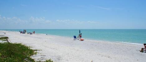 On the beach, beach towels