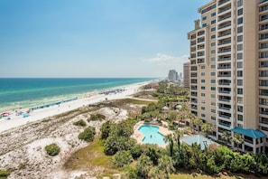 Enjoy ocean views from the comfort of your balcony, with the pool and beach just steps away.