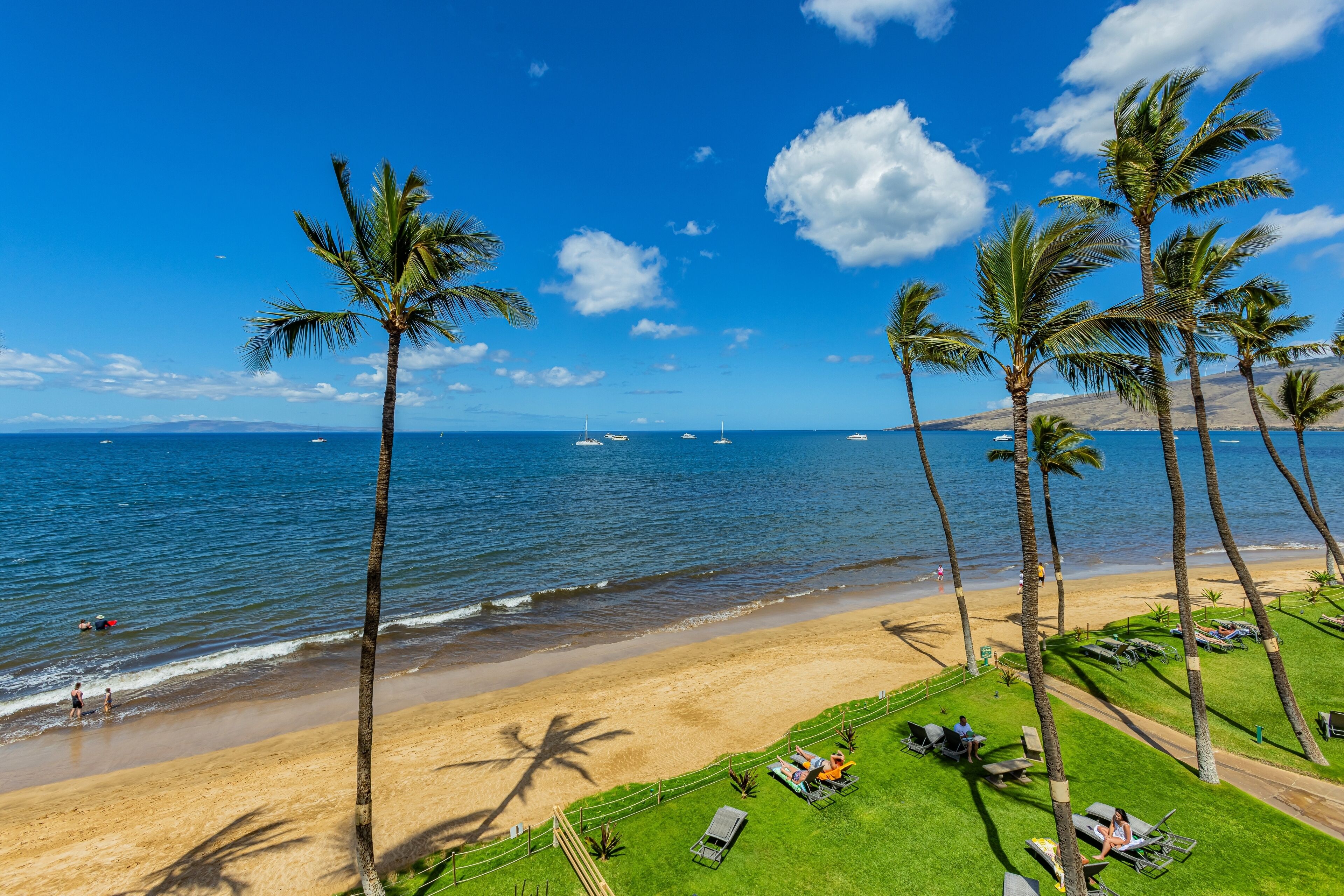 On the beach, sun-loungers, beach towels