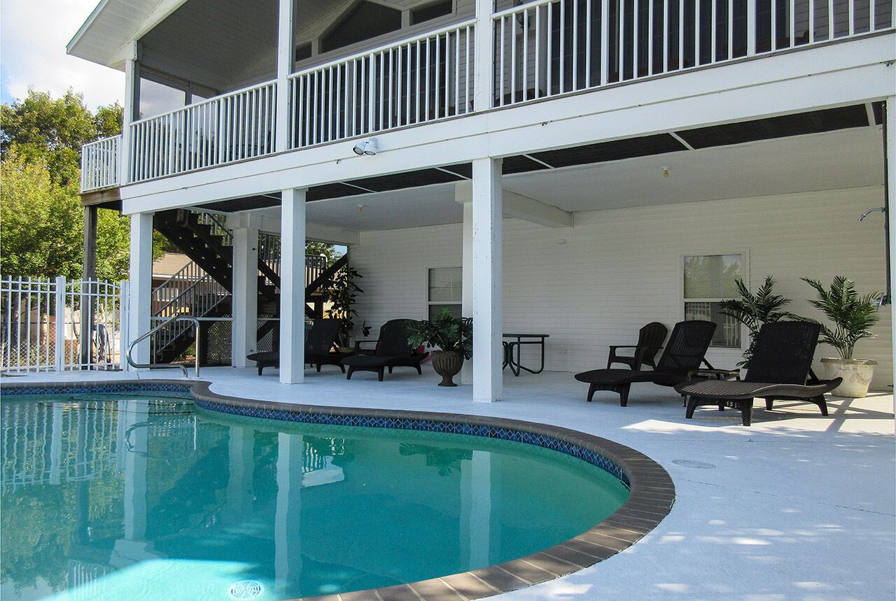 Fabulous Waterfront Island Vacation House!  Walk To Beach! Dock Your Boat! Heated Pool!