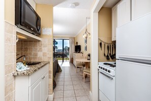 Fridge, microwave, coffee/tea maker, toaster