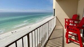 A balcony with a view of the beach and ocean. - Amazing Deluxe Gulf Master! Free Beach Service! Free Golf & Activities Daily! (Panama City Beach)