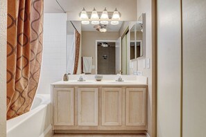 Combined shower/bathtub, hair dryer, towels, soap