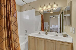 Combined shower/bathtub, hair dryer, towels, soap