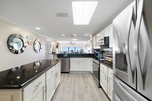 Fridge, microwave, oven, stovetop - Gulf Front Condo | Outdoor & Indoor Pools! (Orange Beach)