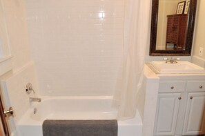 Combined shower/bathtub, hair dryer, towels, soap