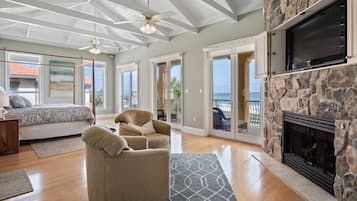 Televisión, chimenea, reproductor de DVD y estéreo