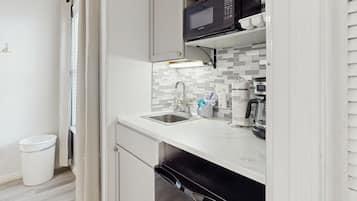 Fridge, microwave, coffee/tea maker, toaster