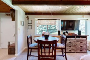 Enjoy meals in this dining area with a round table and four comfortable chairs.