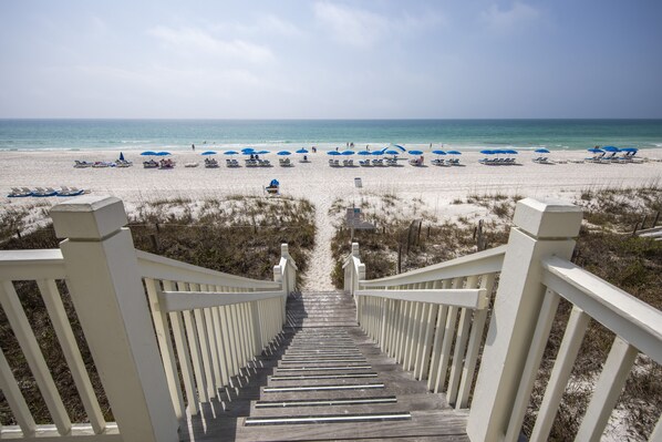 On the beach, sun loungers, beach towels