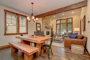 Miners Gold in Suncadia - All Seasons Vacation Rentals - Dining table with seating for 8 with additional seating for 4 at the kitchen island.