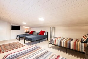 2 habitaciones, tabla de planchar con plancha, cuna de viaje y wifi