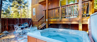 Cozy, enchanting retreat with hot tub, stunning deck, & balcony - close to beach