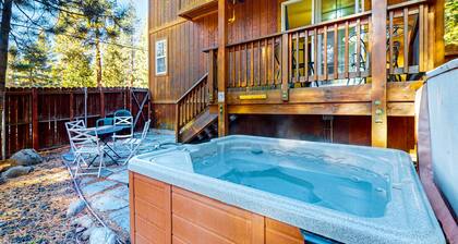 Cozy, enchanting retreat with hot tub, stunning deck, & balcony - close to beach